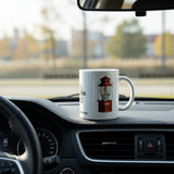 White ceramic coffee mug with a retro illustration of a red Coleman 200A lantern and Old Coleman Parts logo.